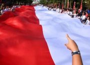 Meriah Kirab Merah Putih di Kota Bogor, Lima Kain Raksasa Membentang Sambut HUT ke-81 RI